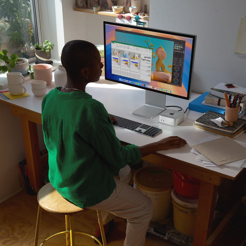 Mac_mini_with_M4_Silver_PDP_Image_Position_6__ar-AE